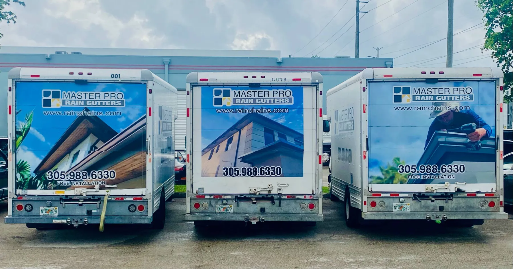 Master Pro Rain Gutters branded work trucks